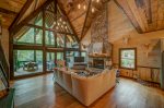 Floor to ceiling glass overlooking the Toccoa River